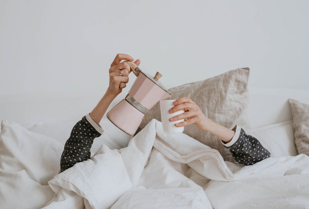 Coffee in bed (Shutterstock)